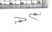 線径0.6mm、D/d≒2.6の曲げを自動機で一発成形したトーションバネ